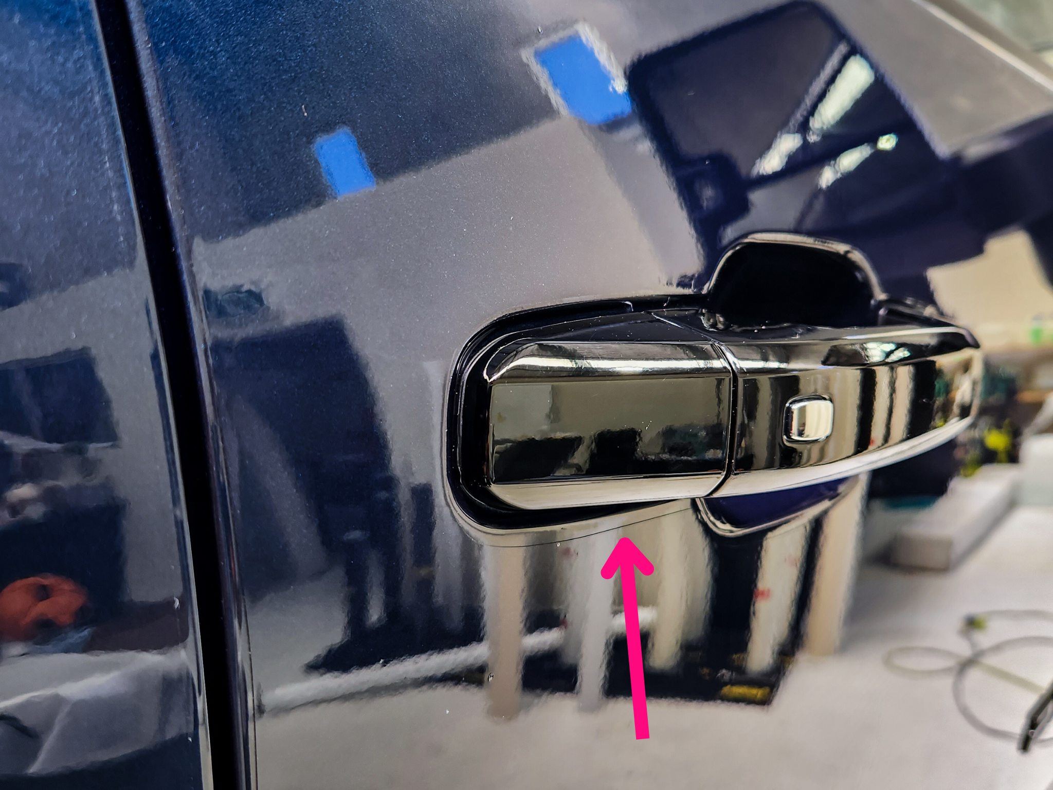 Close up displaying edge of film around door handle